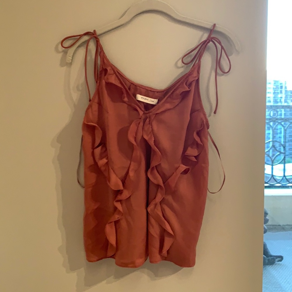 Dark rose colored ruffled blouse